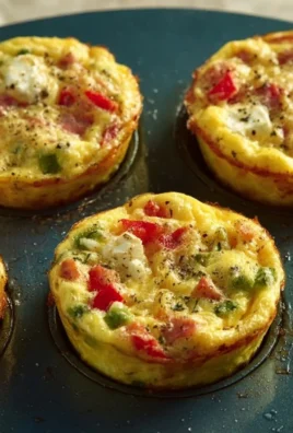 Delicious breakfast egg muffins in a muffin tin ready to eat