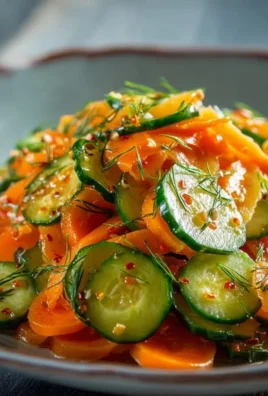 Vibrant cucumber carrot salad with crunchy textures and fresh ingredients.