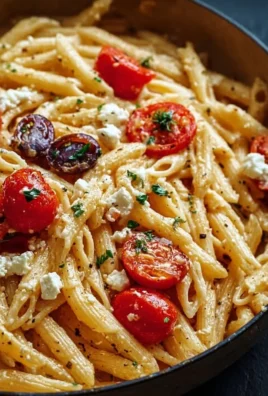 Delicious Greek Pasta topped with Feta cheese and fresh vegetables
