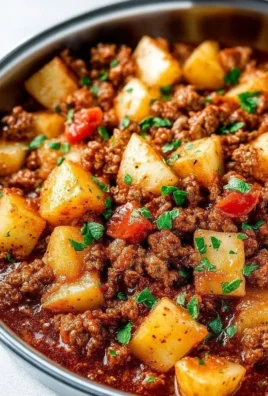 Delicious ground turkey dish with roasted potatoes on a plate