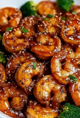 High-protein honey garlic shrimp dish garnished with green onions