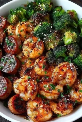 Plate of honey garlic shrimp with sausage and broccoli