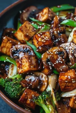 Mushroom Tofu Stir-Fry with fresh vegetables in a vibrant sauce