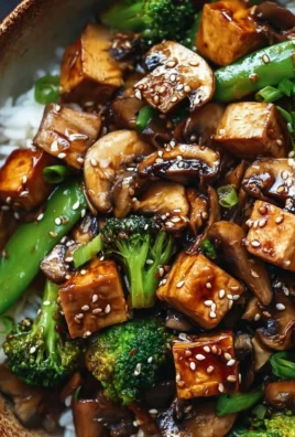 Delicious Mushroom Tofu Stir-Fry served in a bowl with vegetables
