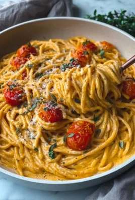 Delicious roasted tomato and garlic ricotta pasta dish served in a bowl