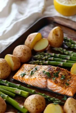 Salmon, potato, and asparagus sheet pan meal ready to serve
