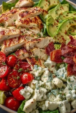 Delicious BLT Chicken Salad with lettuce, tomatoes, bacon, and grilled chicken