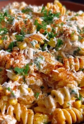 Colorful Street Corn Pasta Salad with fresh ingredients in a bowl.