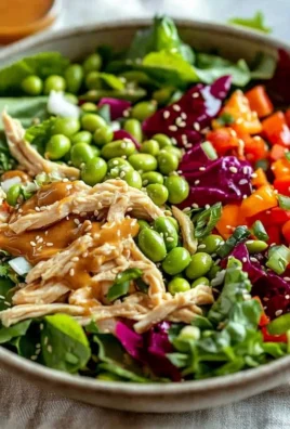 Asian Chicken Crunch Salad with fresh vegetables and crispy toppings