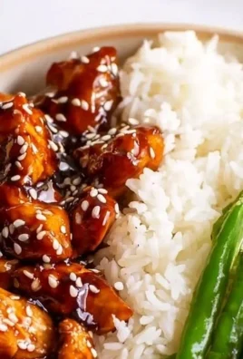 High protein Asian sesame chicken dish served with vegetables