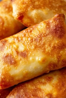 Delicious beef and cheese chimichangas served on a plate