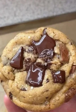 Warm Brown Butter Chocolate Chip Cookies on a cooling rack