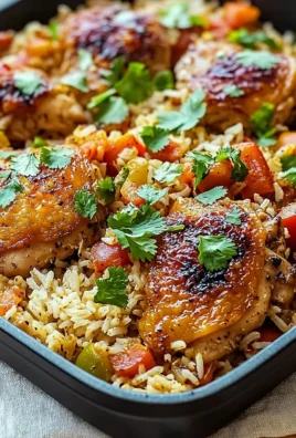 Plate of Caribbean Chicken served with rice and colorful vegetables