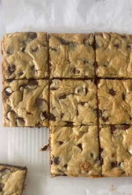 Chewy chocolate chip blondies fresh out of the oven