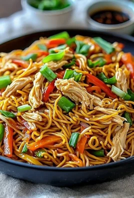 Delicious Chicken Chow Mein served with fresh vegetables and noodles