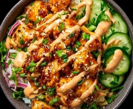 Creamy spicy chicken dish served with jasmine rice