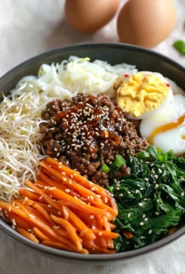 Easy Bibimbap Korean mixed rice bowl with colorful vegetables and toppings