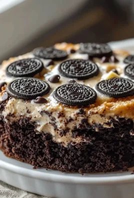 Delicious Easy Oreo Dump Cake topped with crushed Oreos and whipped cream