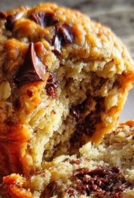 Oatmeal chocolate chip muffins fresh out of the oven, perfect for breakfast.