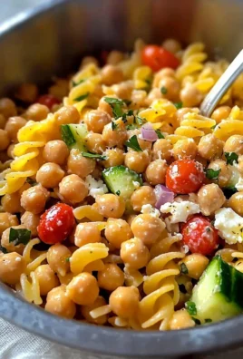 Colorful Greek Pasta Salad with feta cheese and fresh vegetables