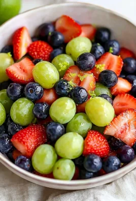 Honey Lime Fruit Salad with colorful fresh fruits and lime dressing