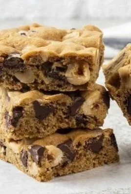 Delicious NESTLÉ® TOLL HOUSE® chocolate chip cookie bars baked to perfection