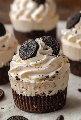 Oreo No-Bake Cheesecake Cups topped with crushed Oreo cookies