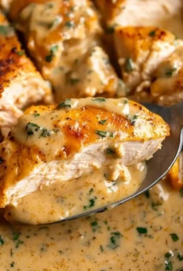Ranch Chicken cooked in a crock pot with herbs and spices for a flavorful dish