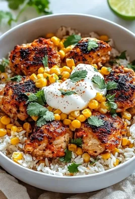 Street Corn Chicken Rice Bowl garnished with fresh herbs and spices