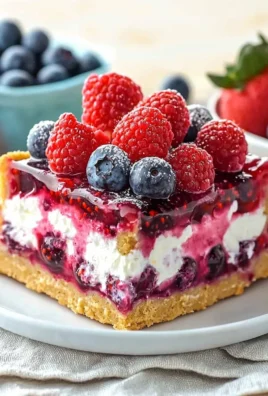 Summer Berry Jello Lasagna layered with fresh berries and jello