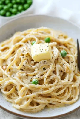 Creamy vegan cashew alfredo sauce served with pasta
